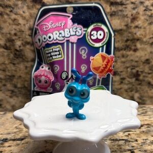 Disney Doorables Neon Pop Blue Collectible Mini Figure